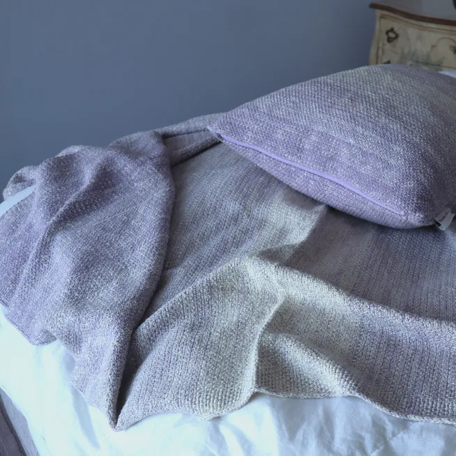 purple knitted throw