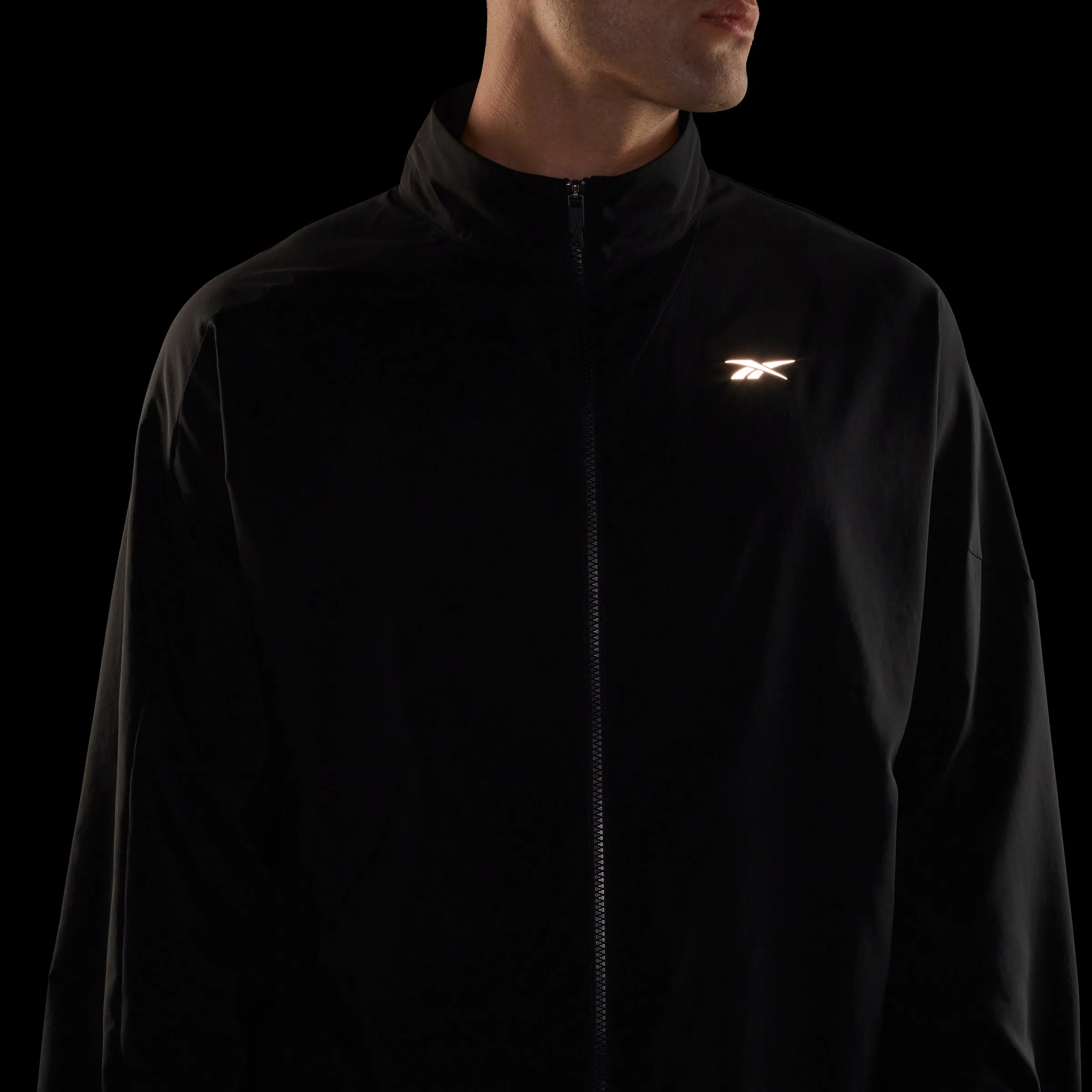 Reebok Apparel Men Running Woven Windbreaker Black